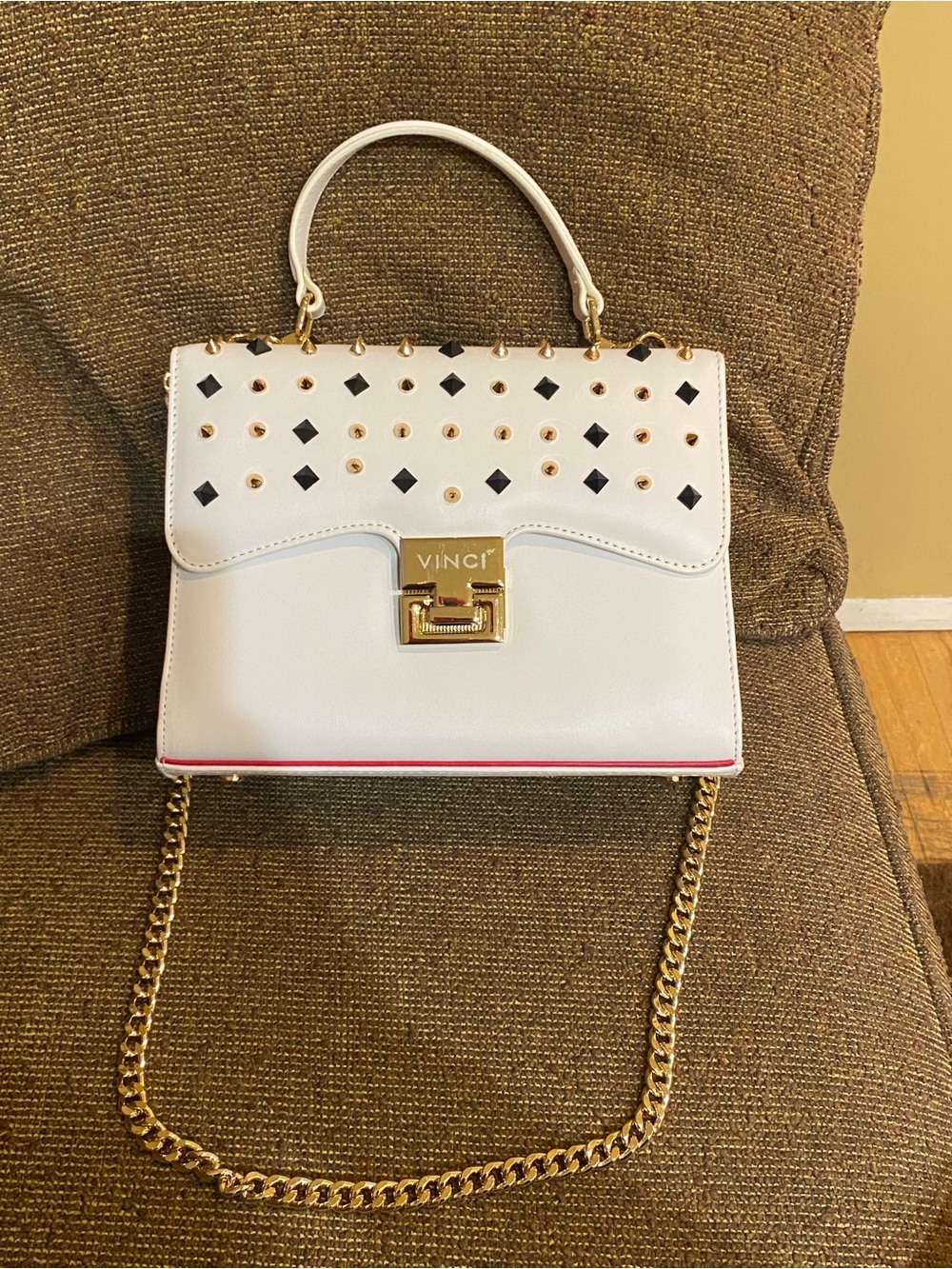 Vinci white spike leather bag. Gorgeous!!!! Black/gold  stud embellishments